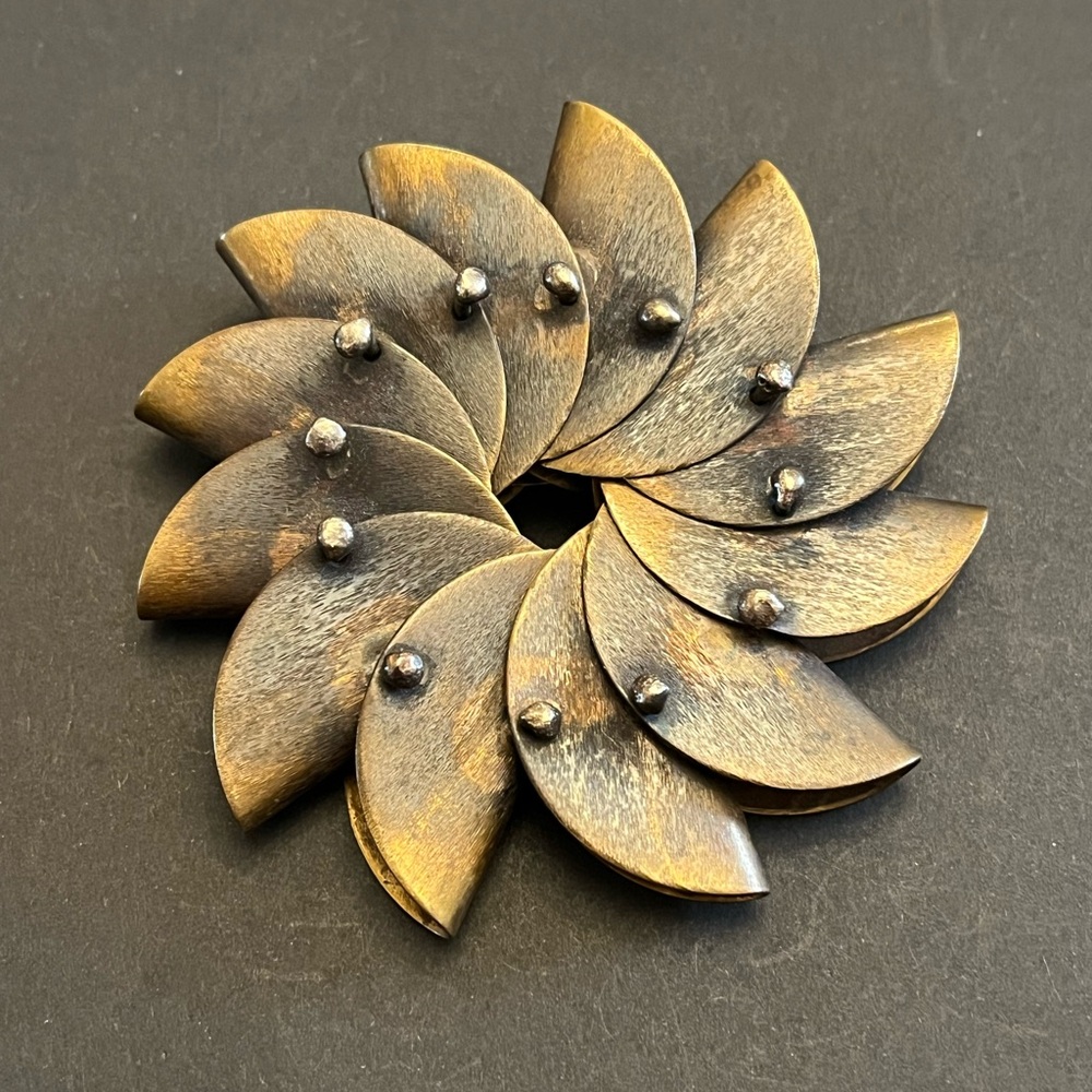 Mena Messina Articulated Pinwheel Brooch.